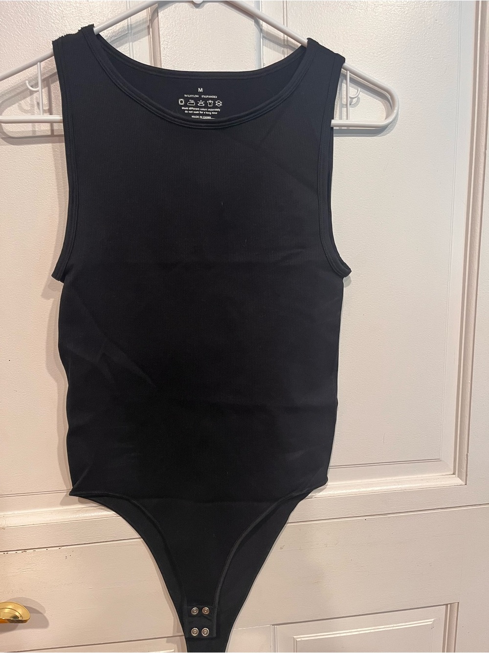 Black Ribbed Sleeveless Bodysuit